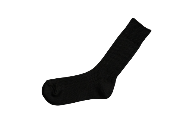 single black ribbed sock isolated on black background from Iron Shop Provisions