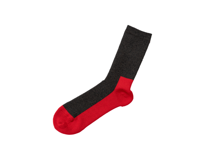 Iron Shop Provisions black and red crew sock isolated on black background