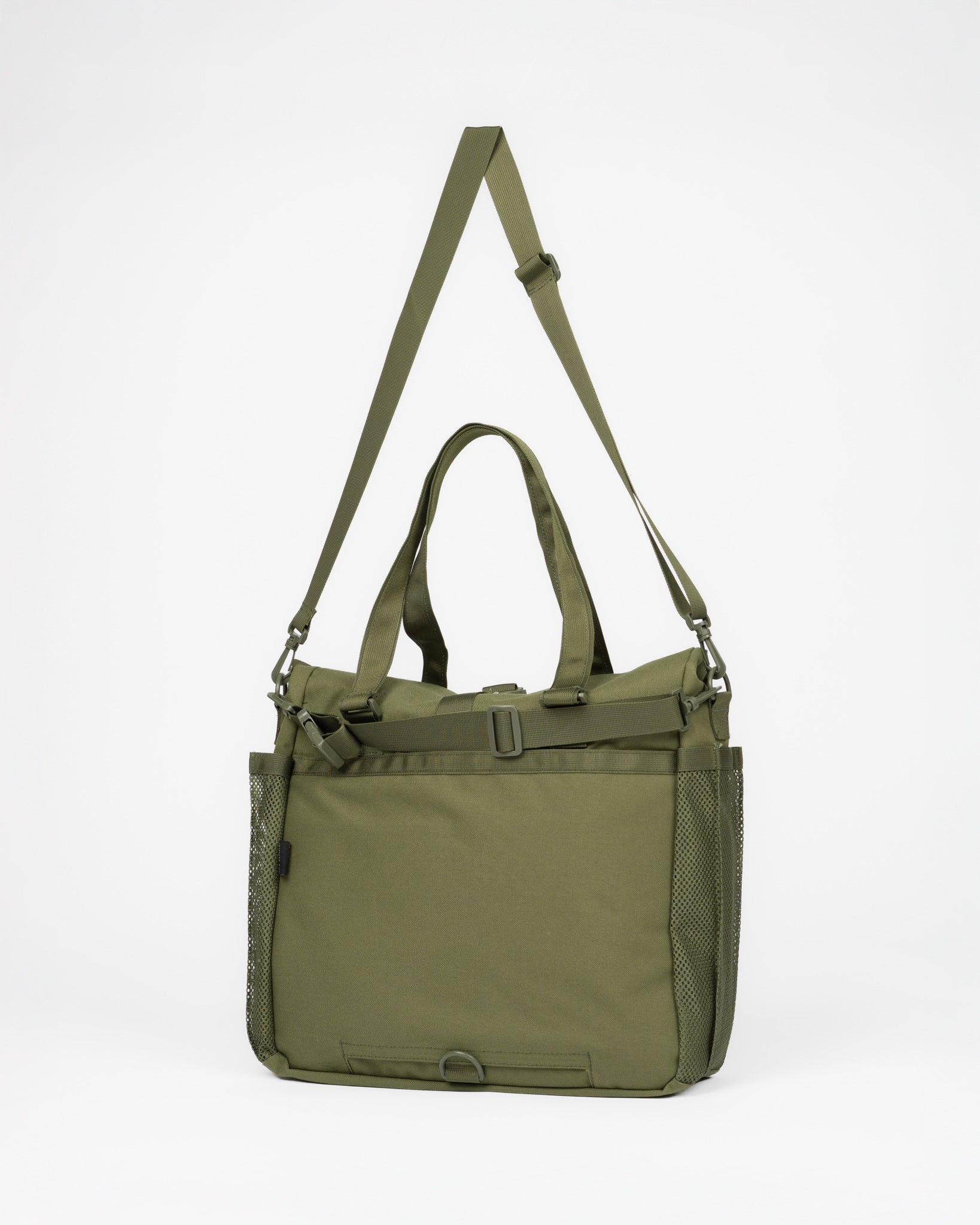 An olive green tote bag with a long shoulder strap, top handles, and a front utility pocket, shown against a plain white background.