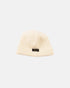 Natural color ribbed wool knit watch cap with folded brim and Dehen 1920 label