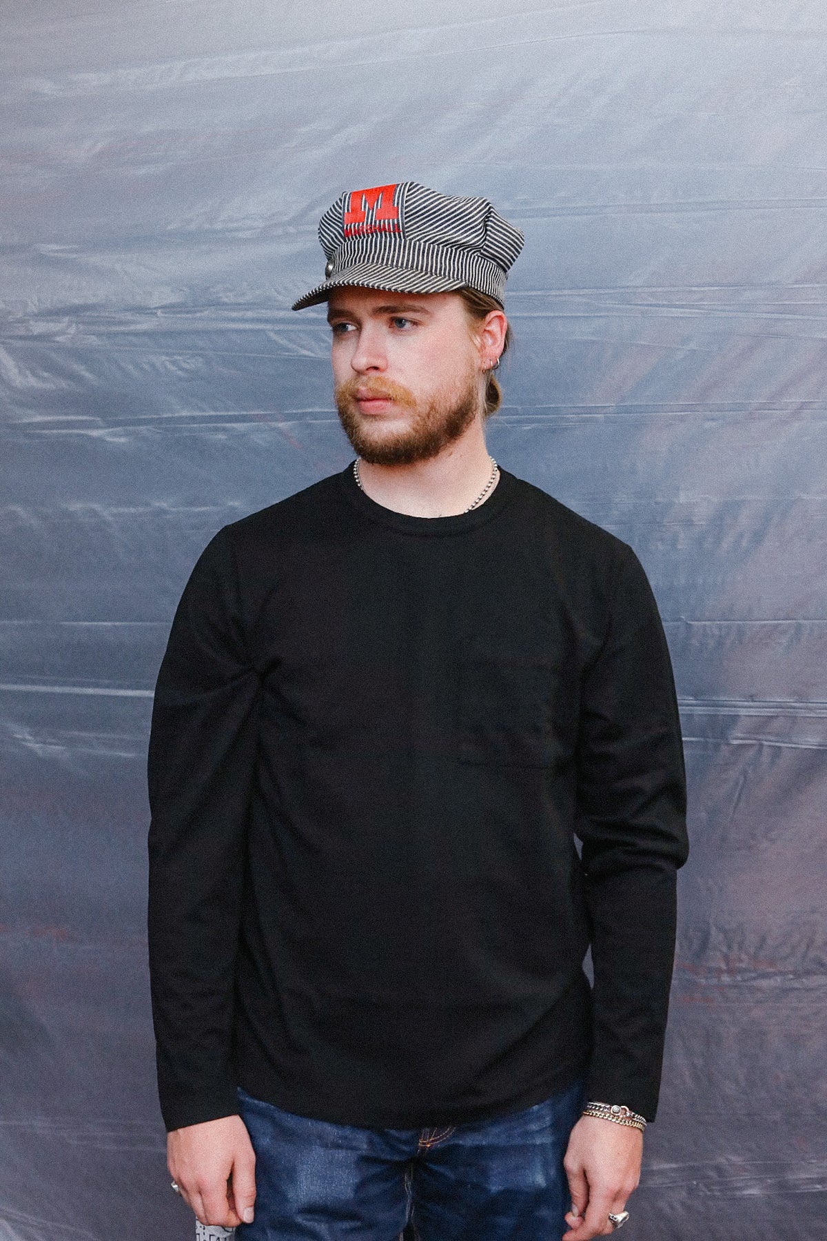 man wearing  black Long sleeve t-shirt