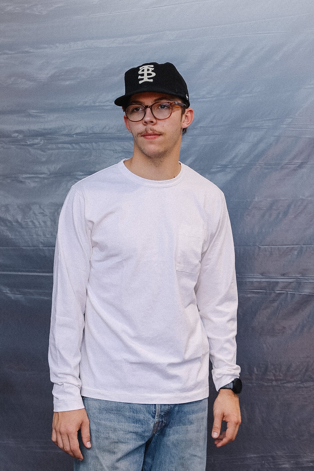 man wearing long sleeve white t-shirt 