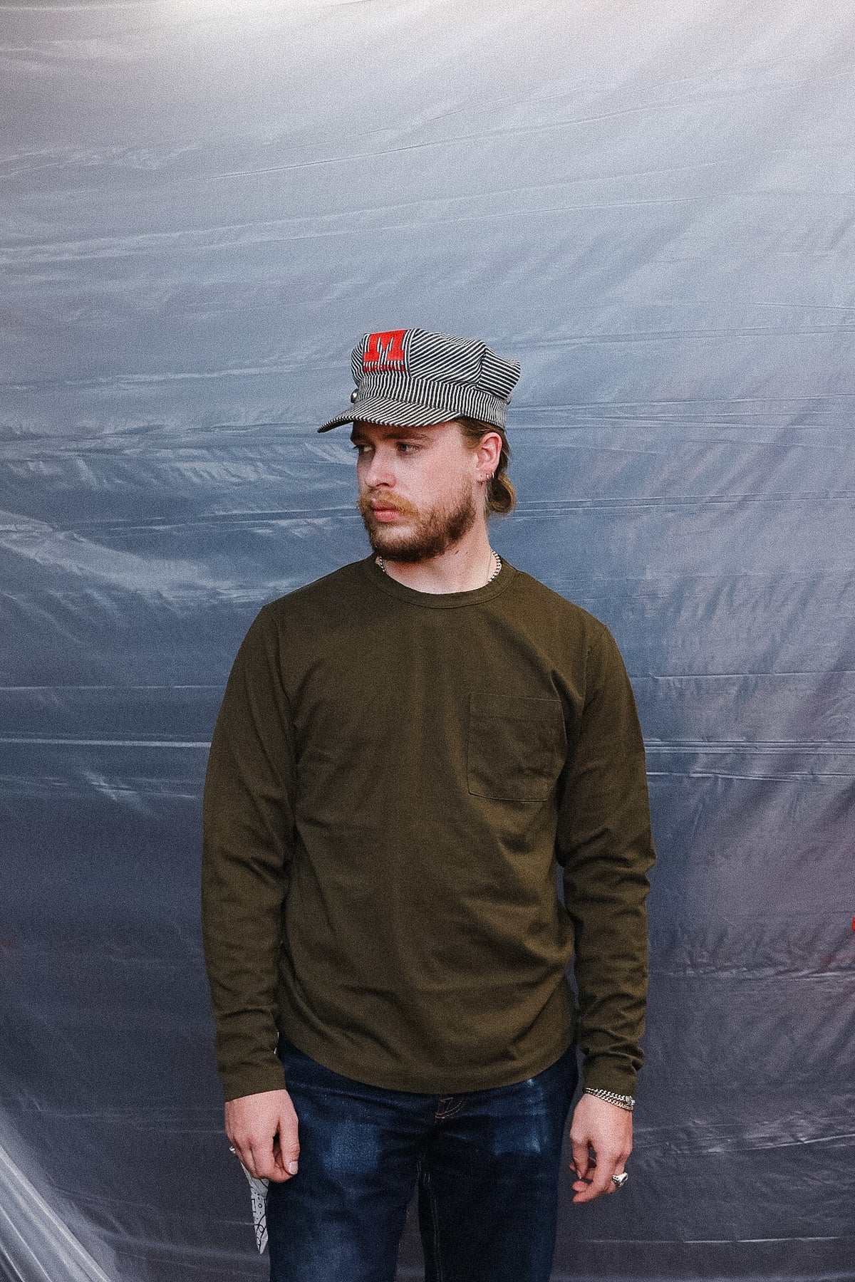 Man wearing Green long sleeve t-shirt 
