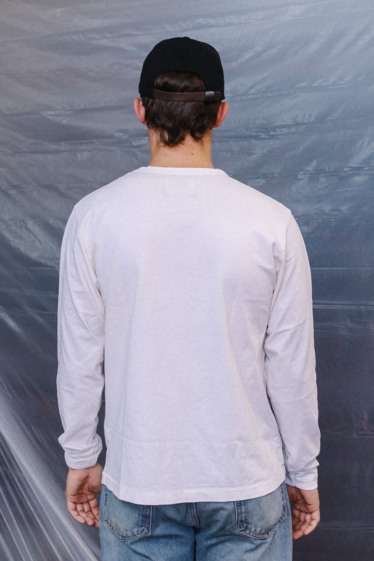 man wearing long sleeve white t-shirt 