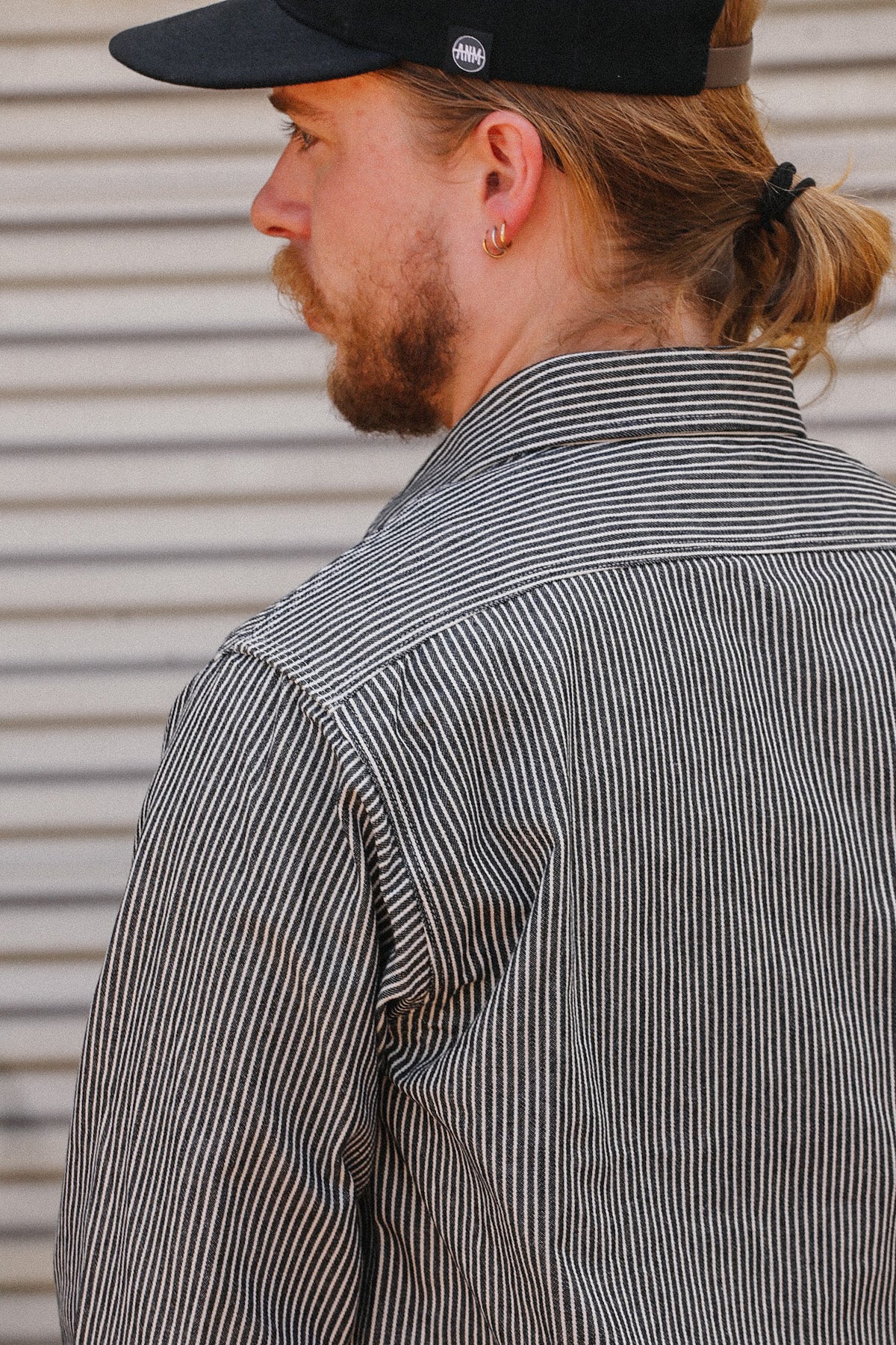 Up close detail of striped denim shirt