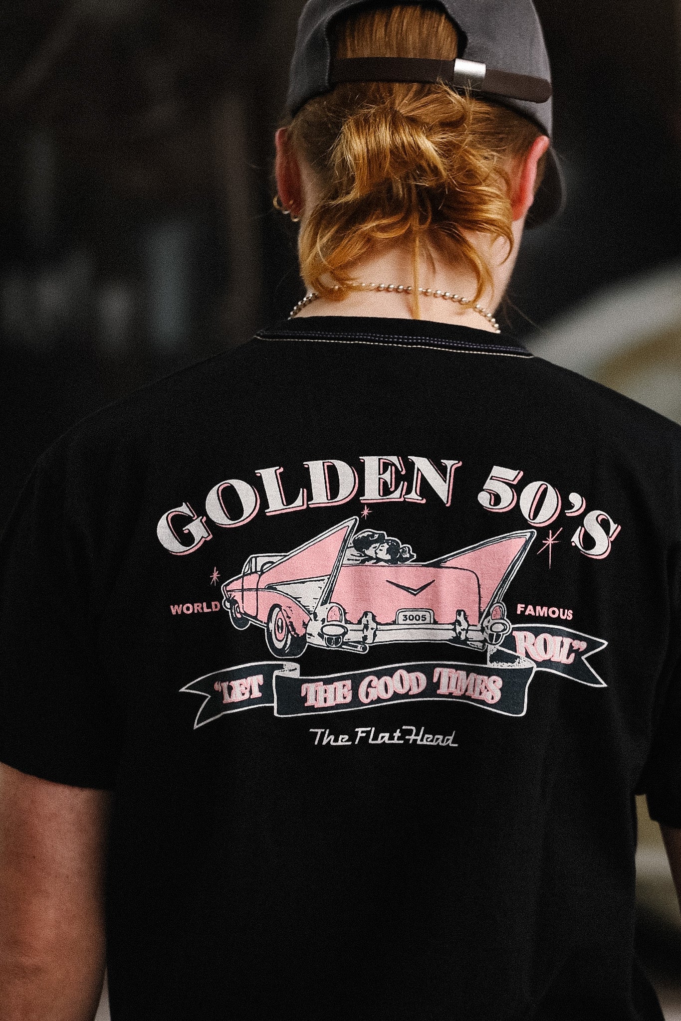 detail shot of graphic tee with a car