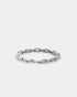 Sterling silver mixed motif bracelet with polished and textured chain links on white background