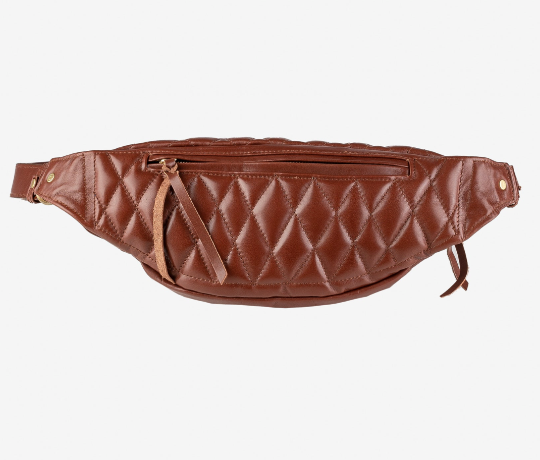 Brown quilted fanny pack on a light gray background