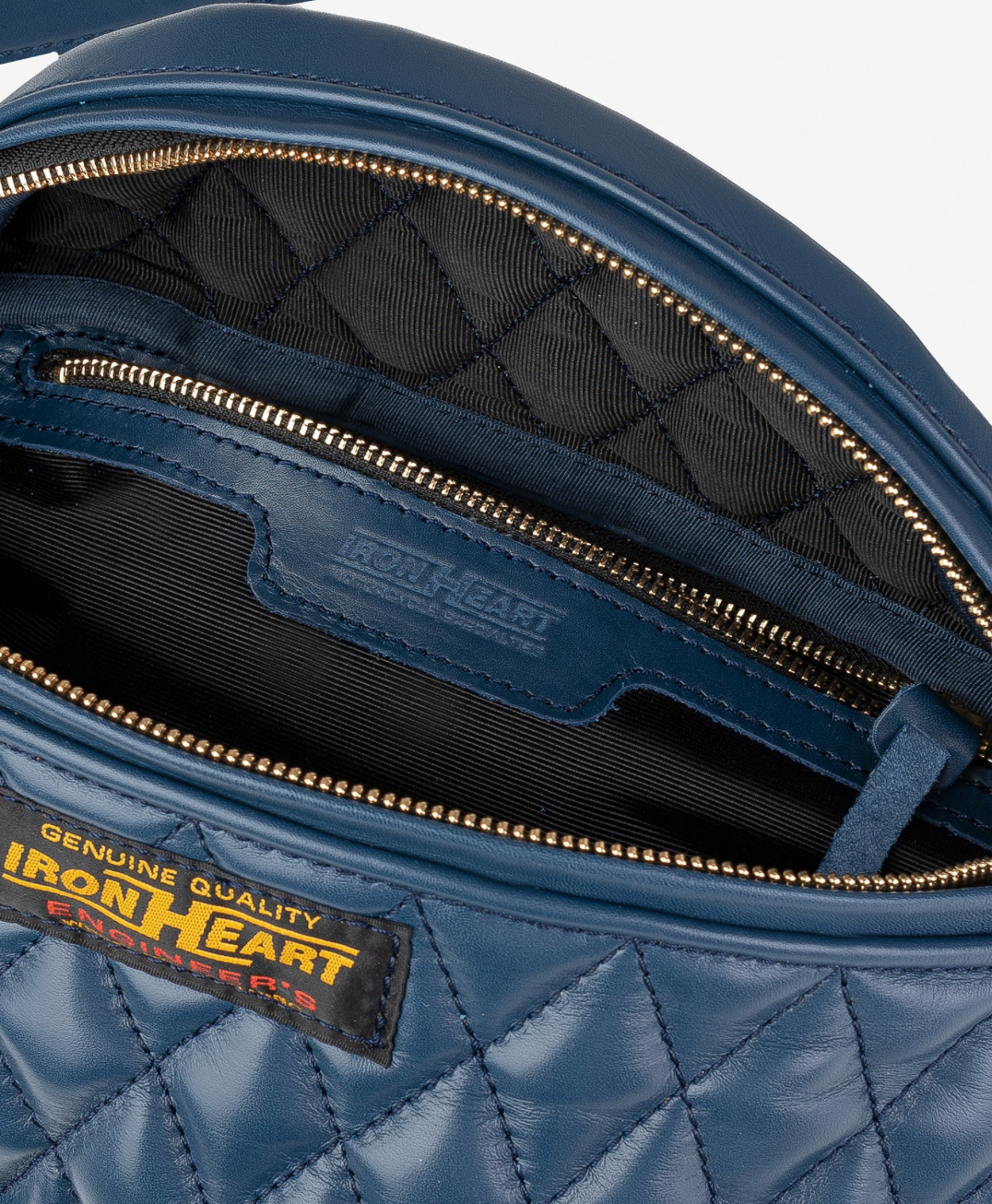 Blue quilted bag with 'Iron Heart' branding on a white background