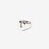 Polished silver horseshoe-shaped ring on white background, minimalist design from Iron Shop Provisions