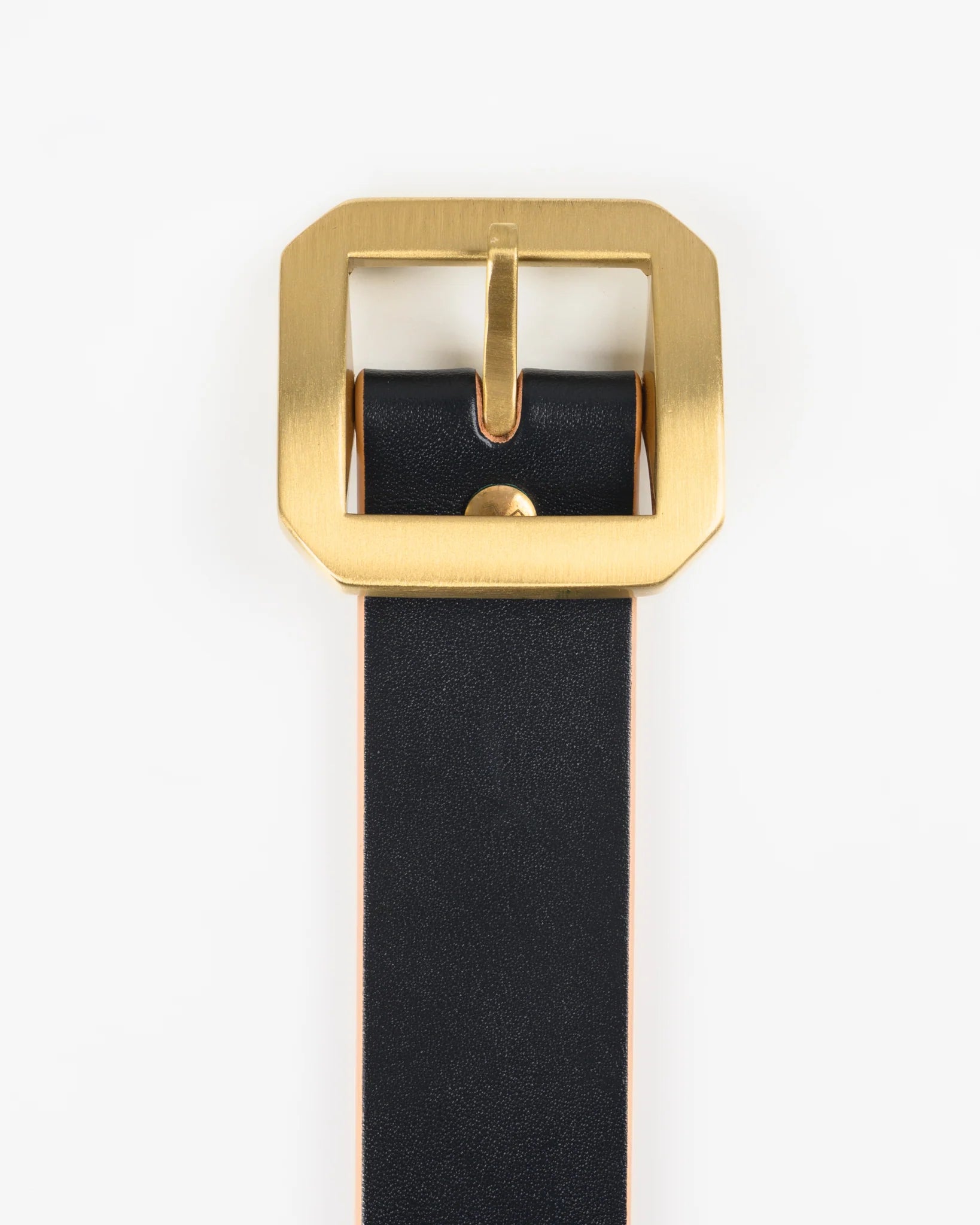 Black belt with a gold buckle on a white background