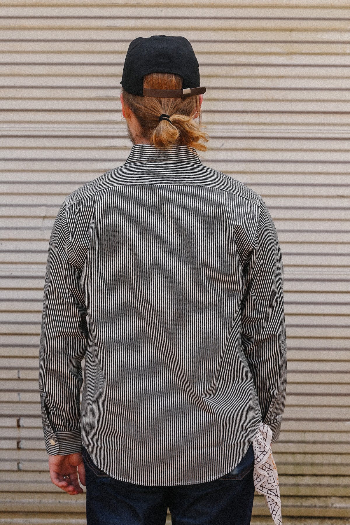 Up close detail of striped denim shirt