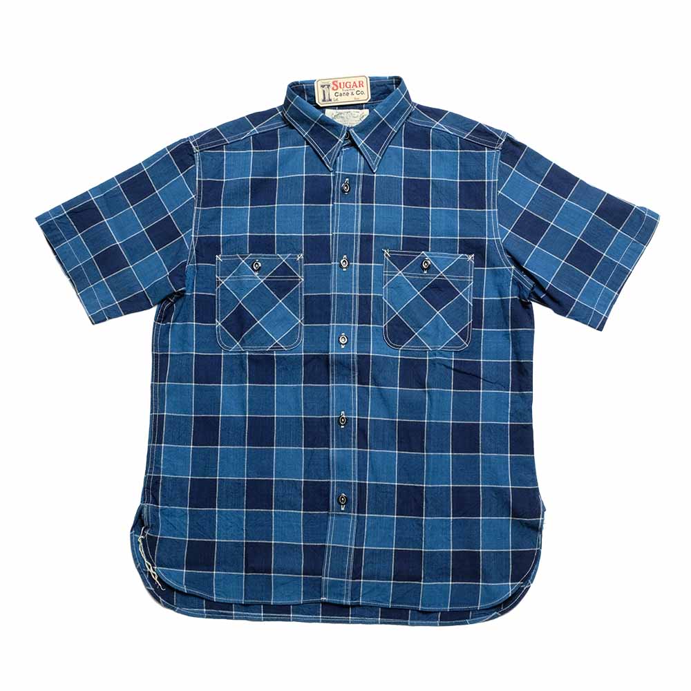 Blue plaid shirt with short sleeves on a white background