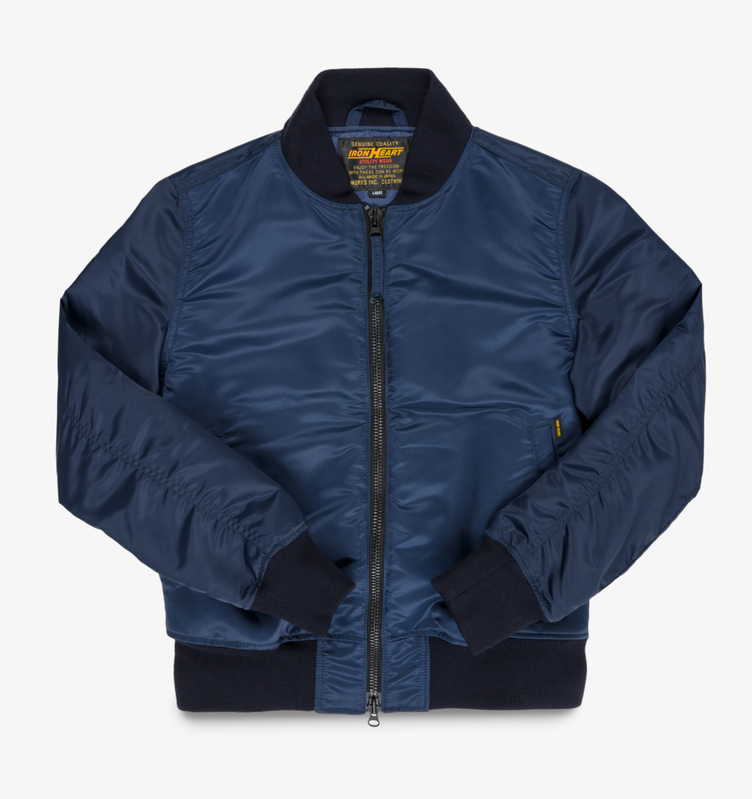Navy blue bomber jacket on a white background