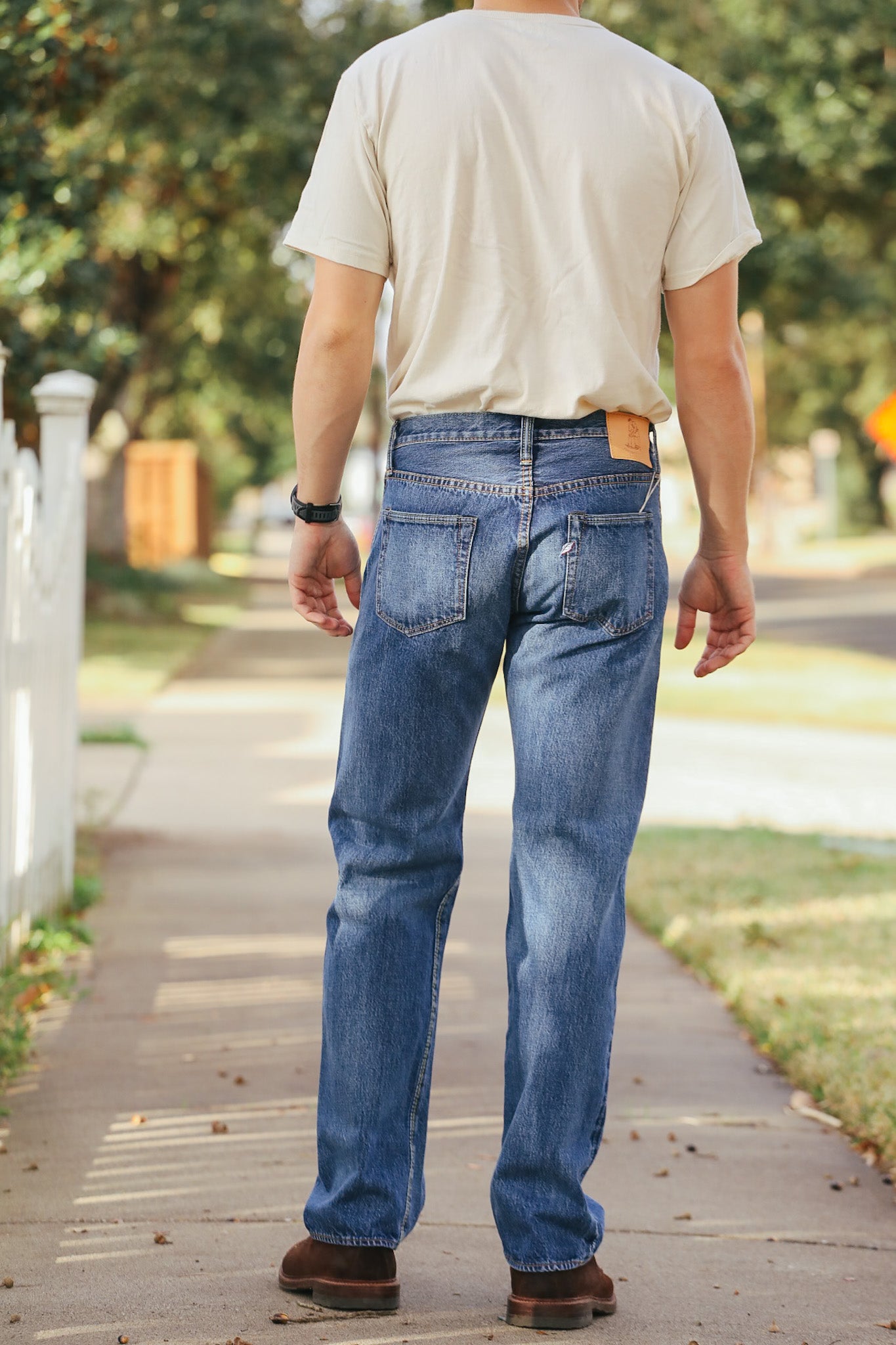 man wearing light color jeans 