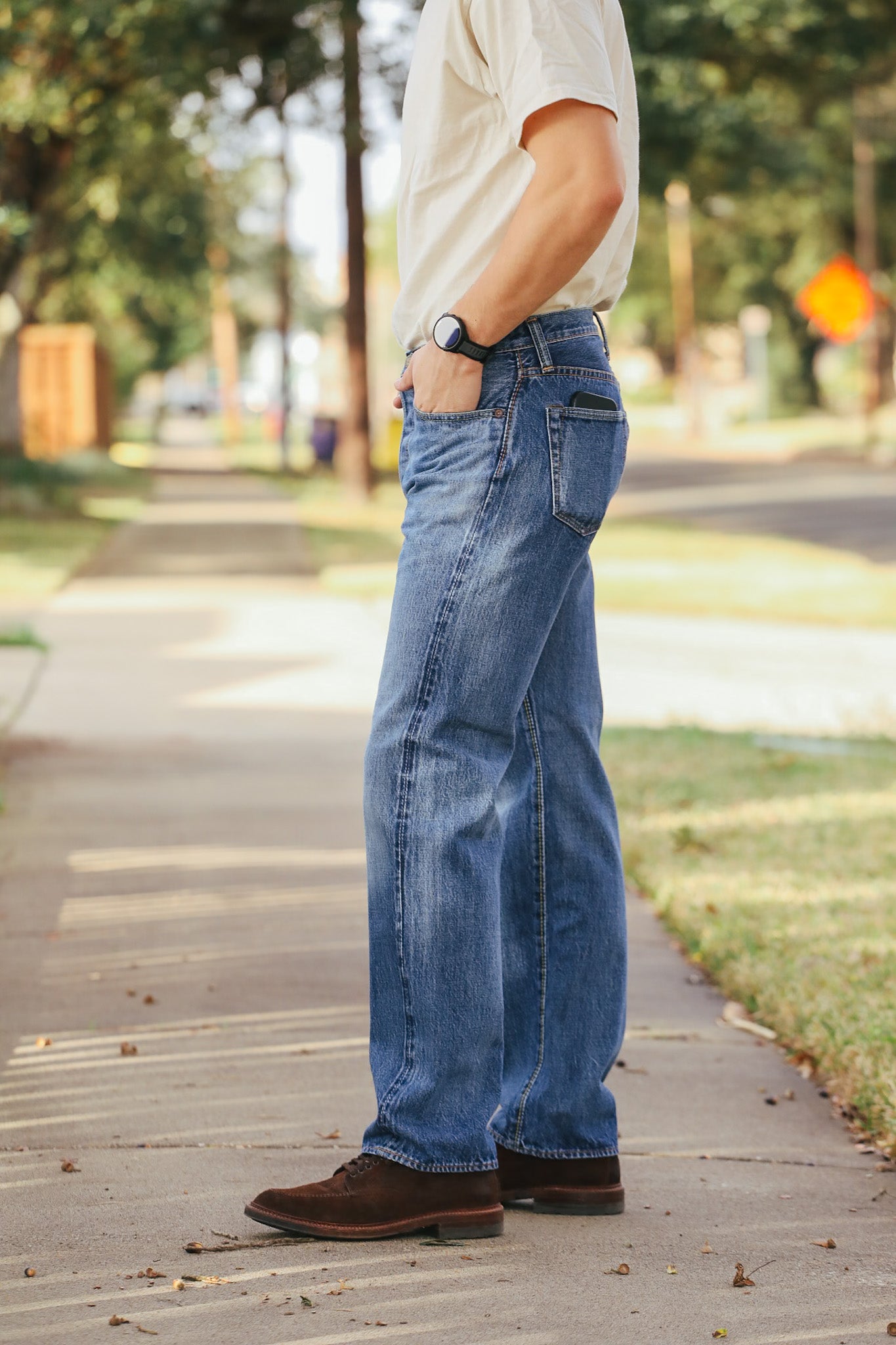 man wearing light color jeans 