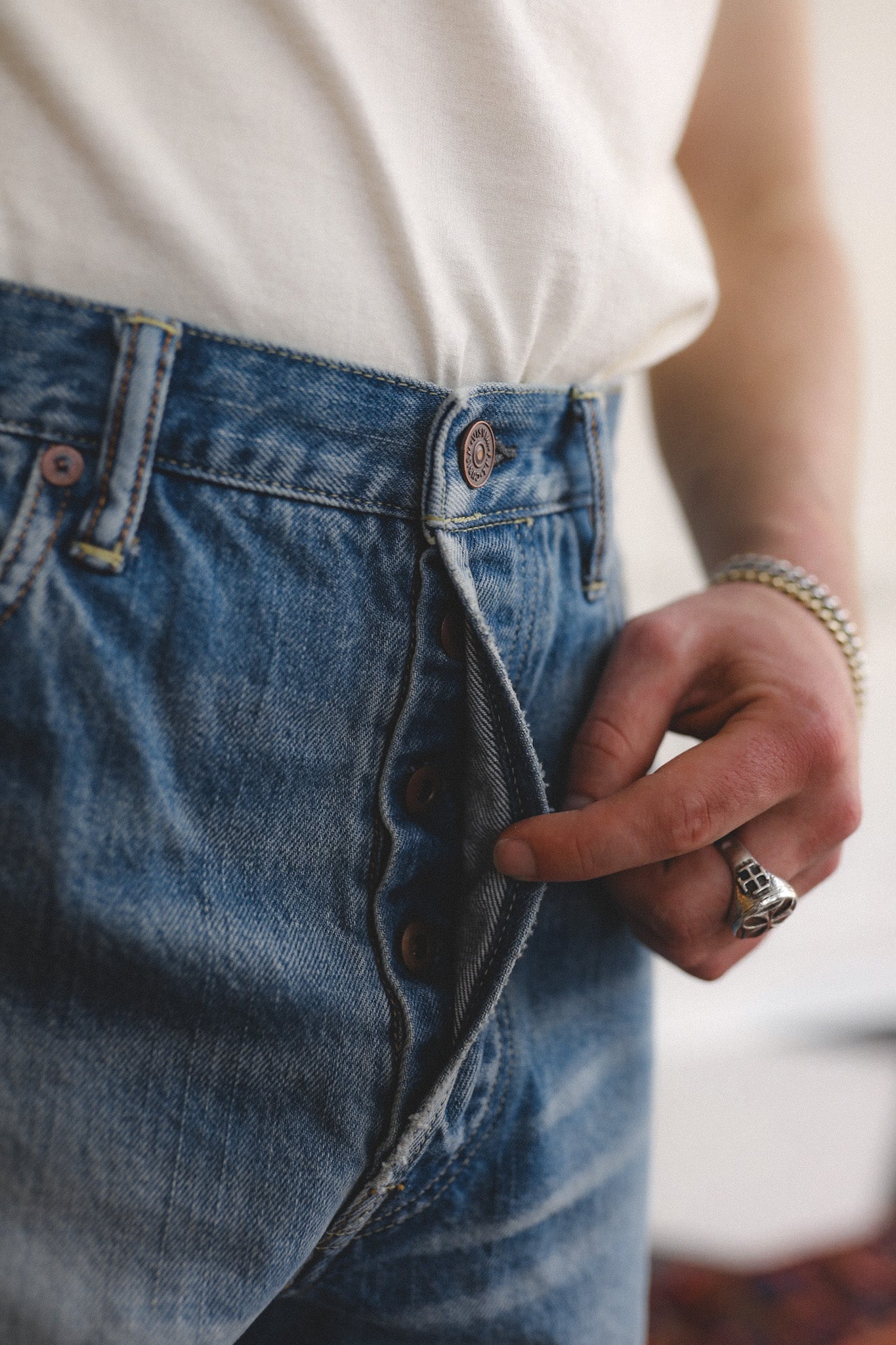 Close-up of blue jeans with a blurred background