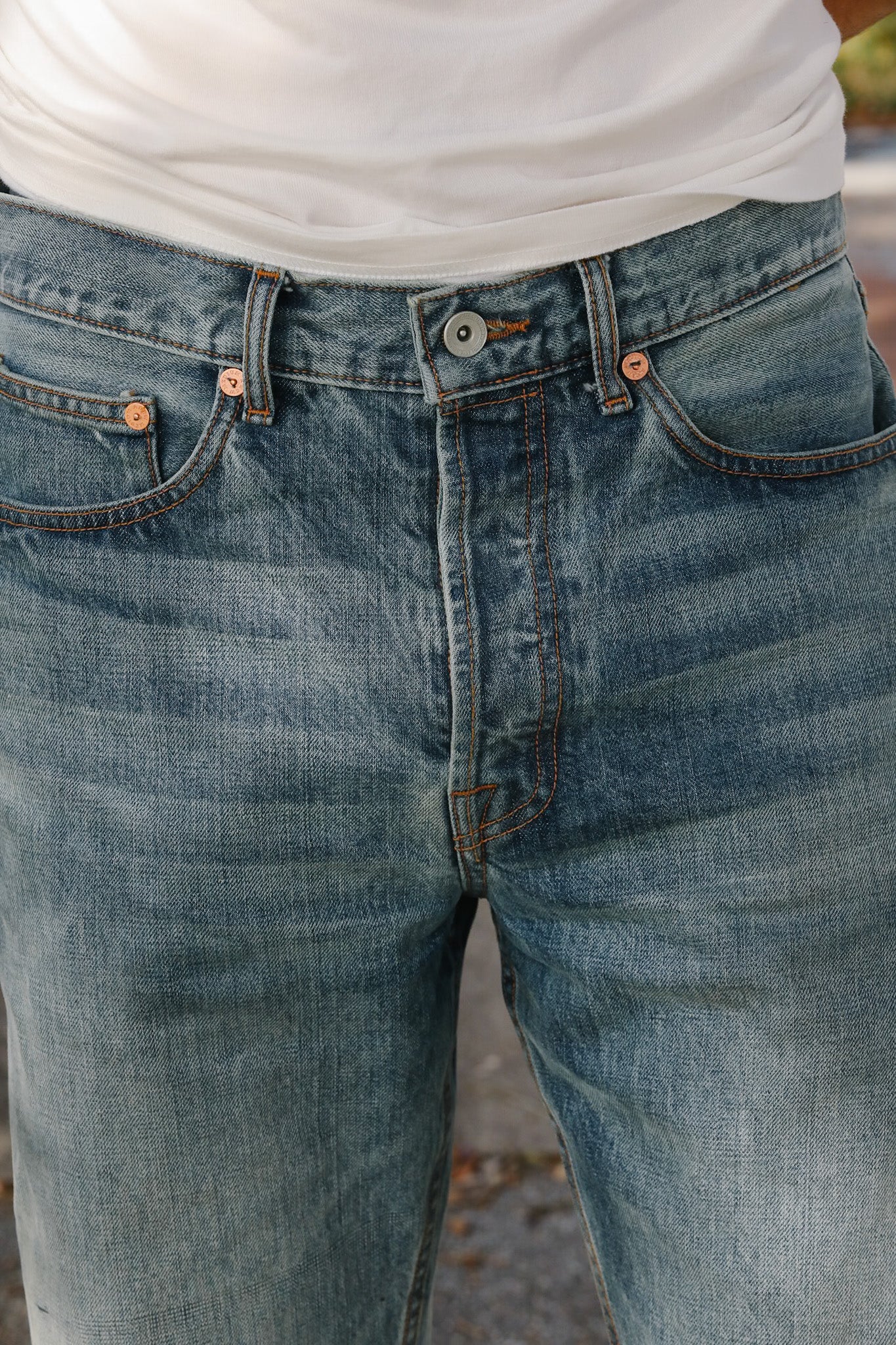 Close-up of blue jeans with a blurred background